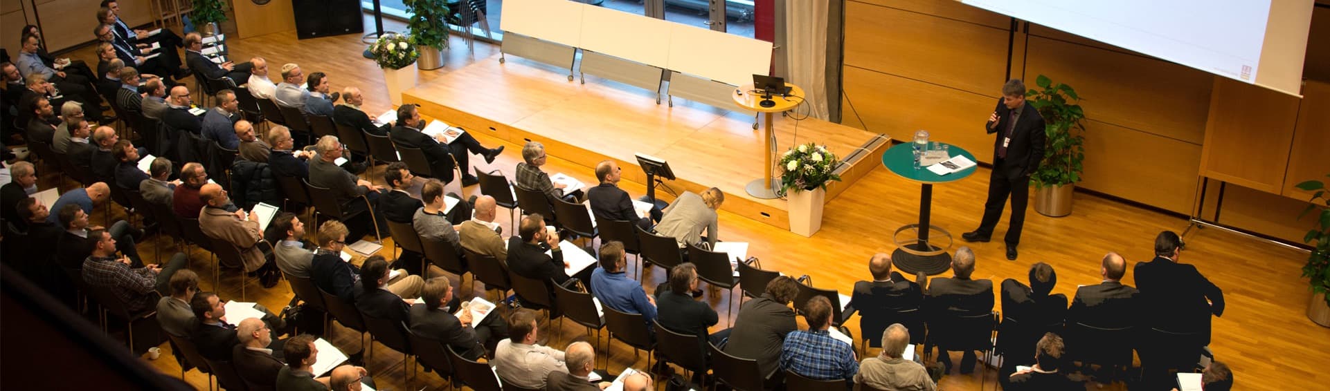Professional education session in a conference auditorium
